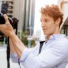 A man holding a camera